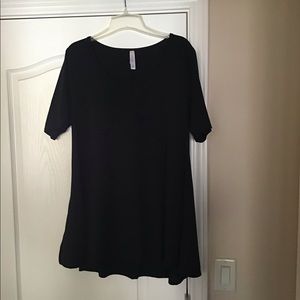 LuLaRoe Perfect Tee, with side slits, pairs perfectly with jeans and leggings.